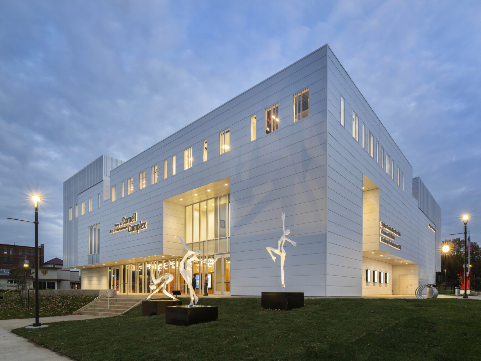 The Harry M. Cornell Arts and Entertainment Complex, a white building with recess glass, view to double height atrium