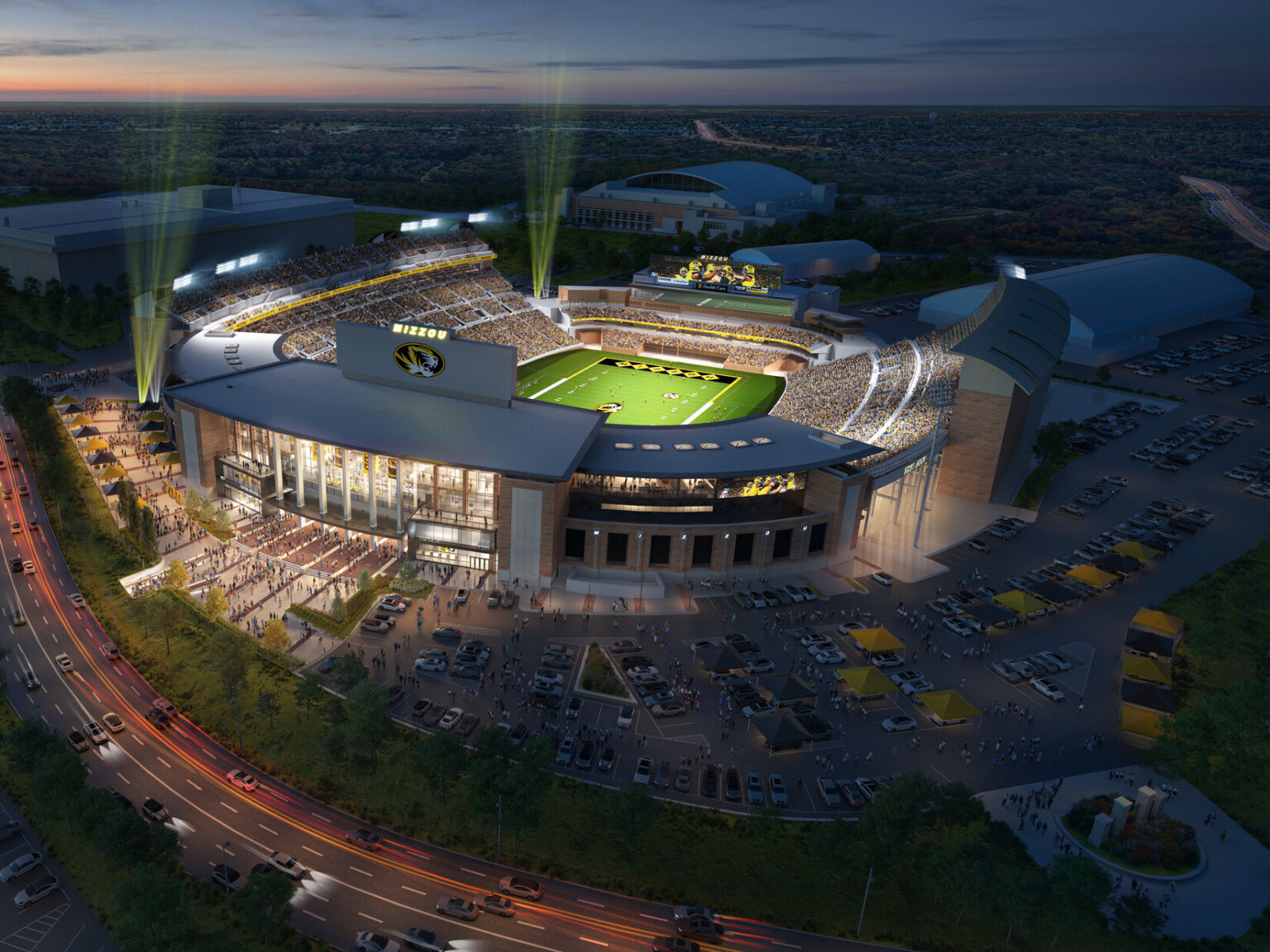 aerial rendering of University of Missouri Mizzou Memorial Stadium illuminated for a night game after renovation