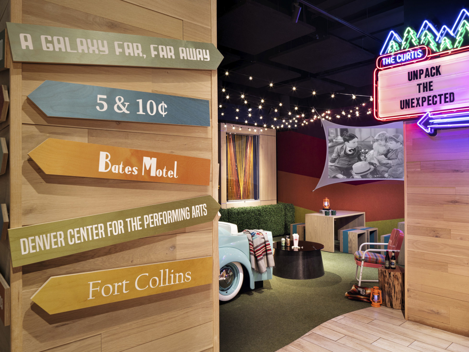 the curtis hotel lobby with pop culture references and neon signs