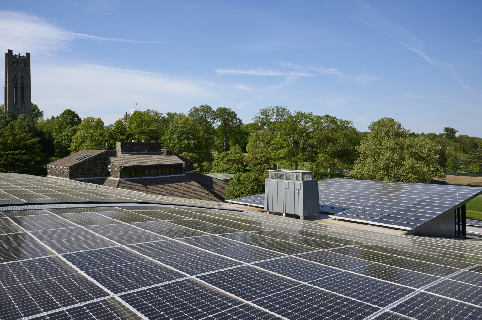 Rooftop solar panels at a higher education university campus; college campus, sustainability planning