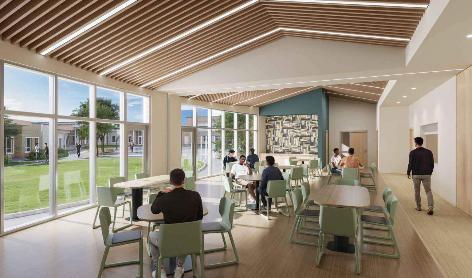 Seating area with floor to ceiling windows filled with tables and chairs.