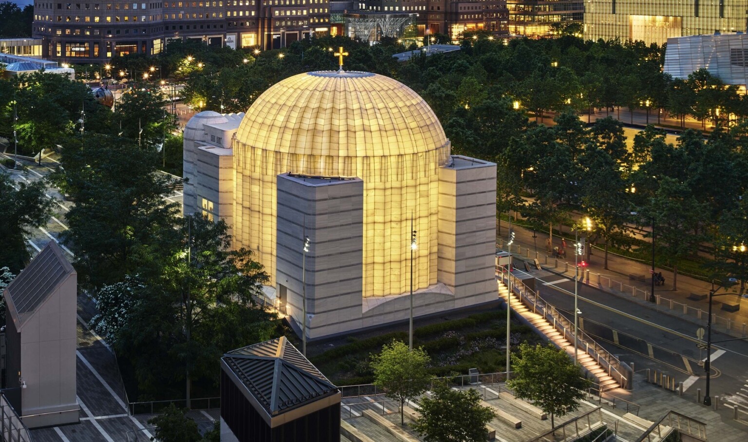 Exterior of the Saint Nicholas Greek Orthodox Church in New York City featuring the ambient glow of light