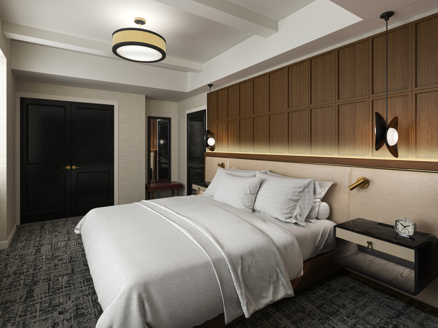 Modern hotel room with black doors, dark grey carpeting, white linens and brown wood accents