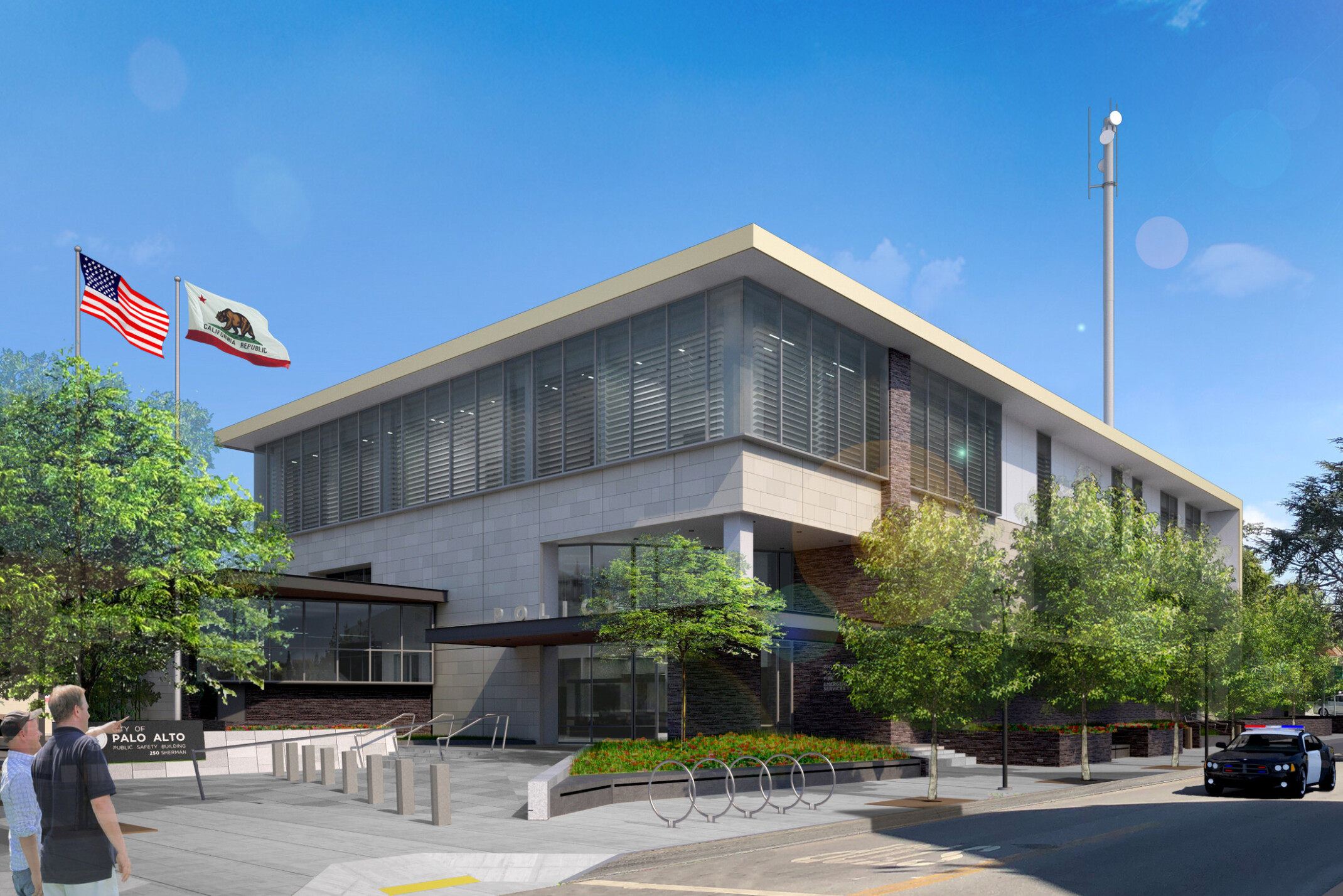 Palo Alto Public Safety Building canopied entrance to multi story light stone building, floor to ceiling windows on second floor, wrapped facade