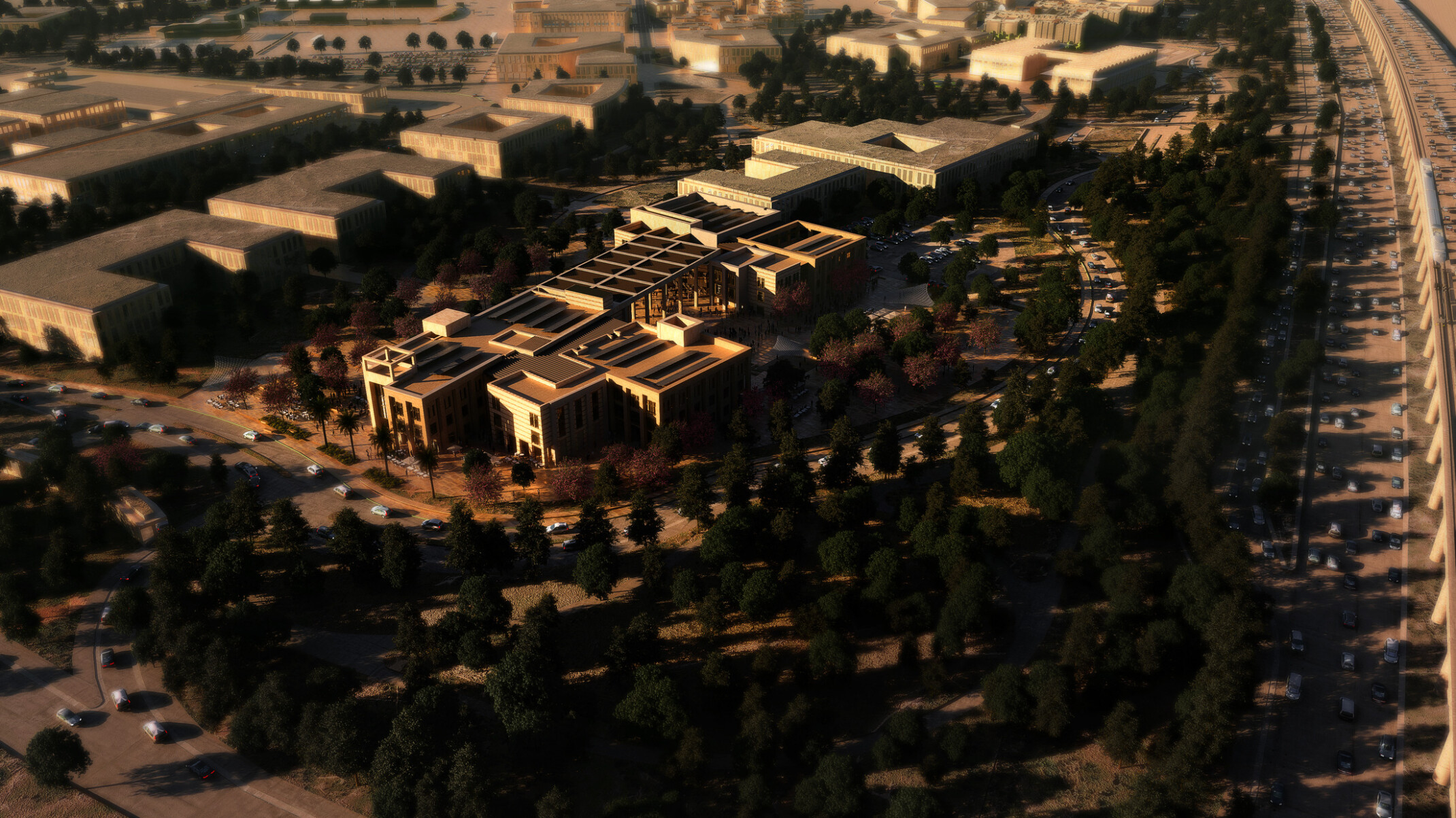 Aerial view of American University in Cairo campus extension featuring modern architecture and abundant greenery