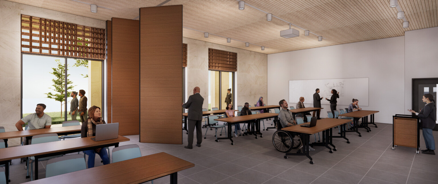 An interior render of a university classroom designed for flexible learning. The room features movable partitions, allowing for customizable space division. The room includes accessible features, such as a student in a wheelchair, highlighting inclusivity.