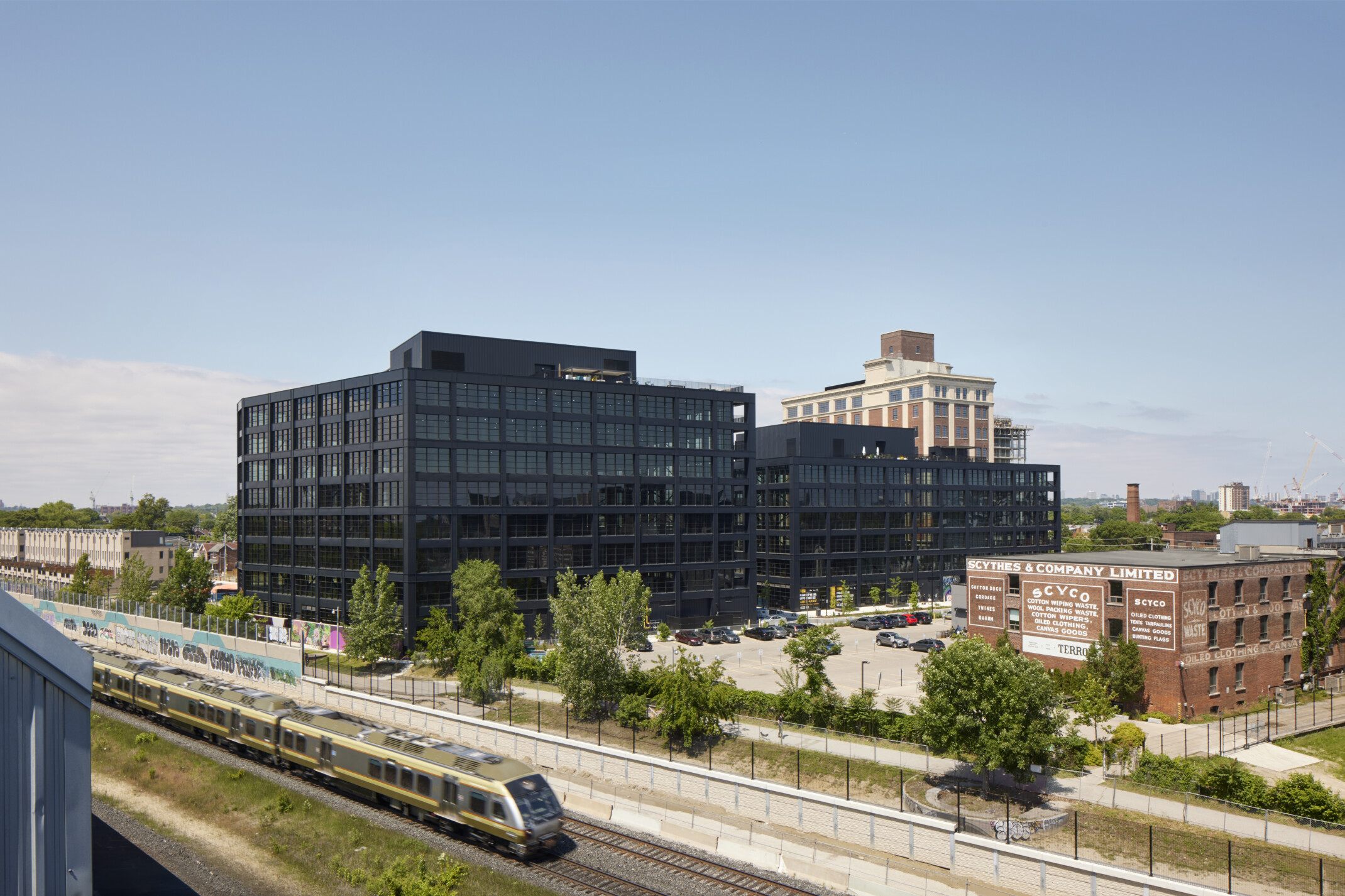 Black steel exterior midrise mass timber building