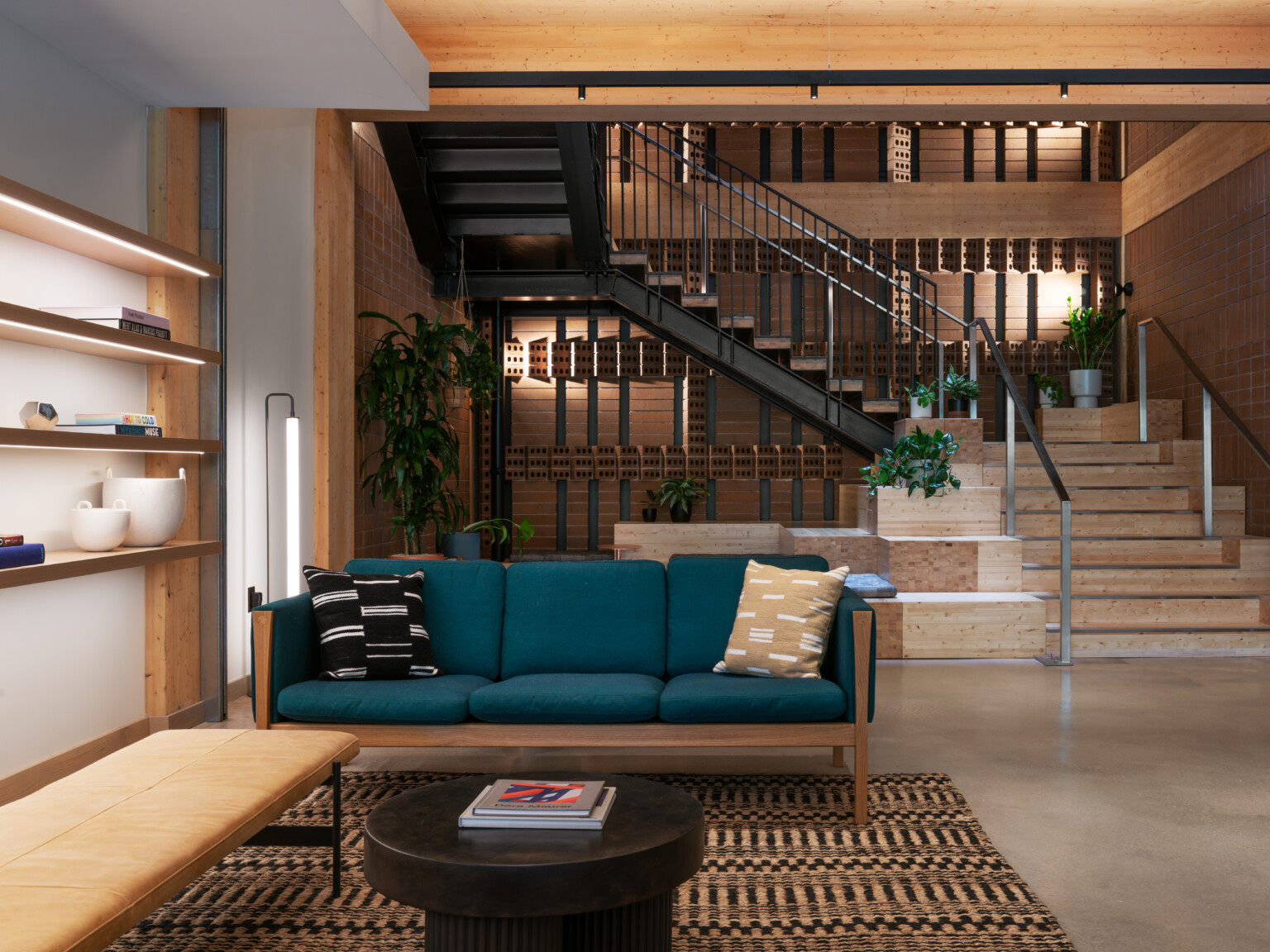 Mass timber exposed wood interior stairwell with warm accents